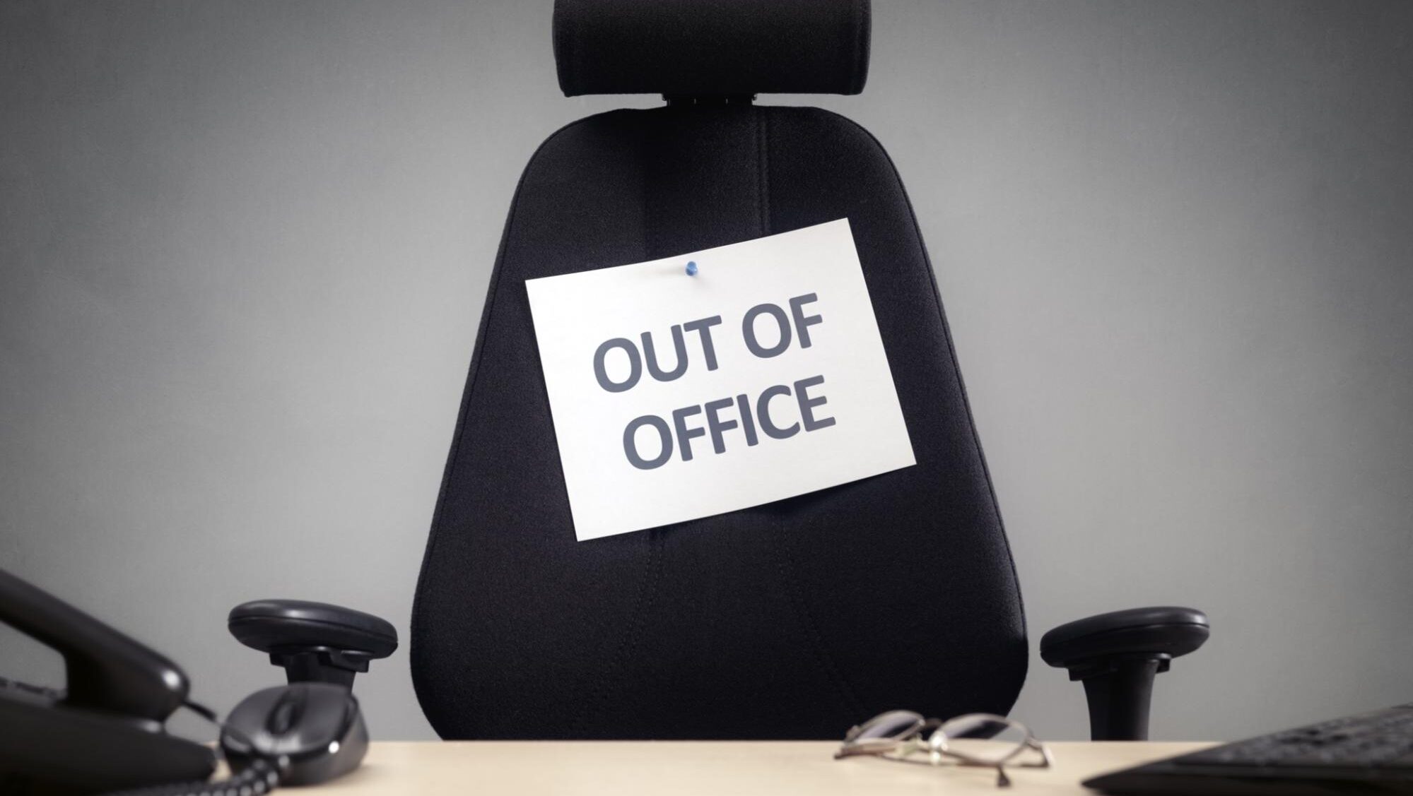 Chair with out of office sign