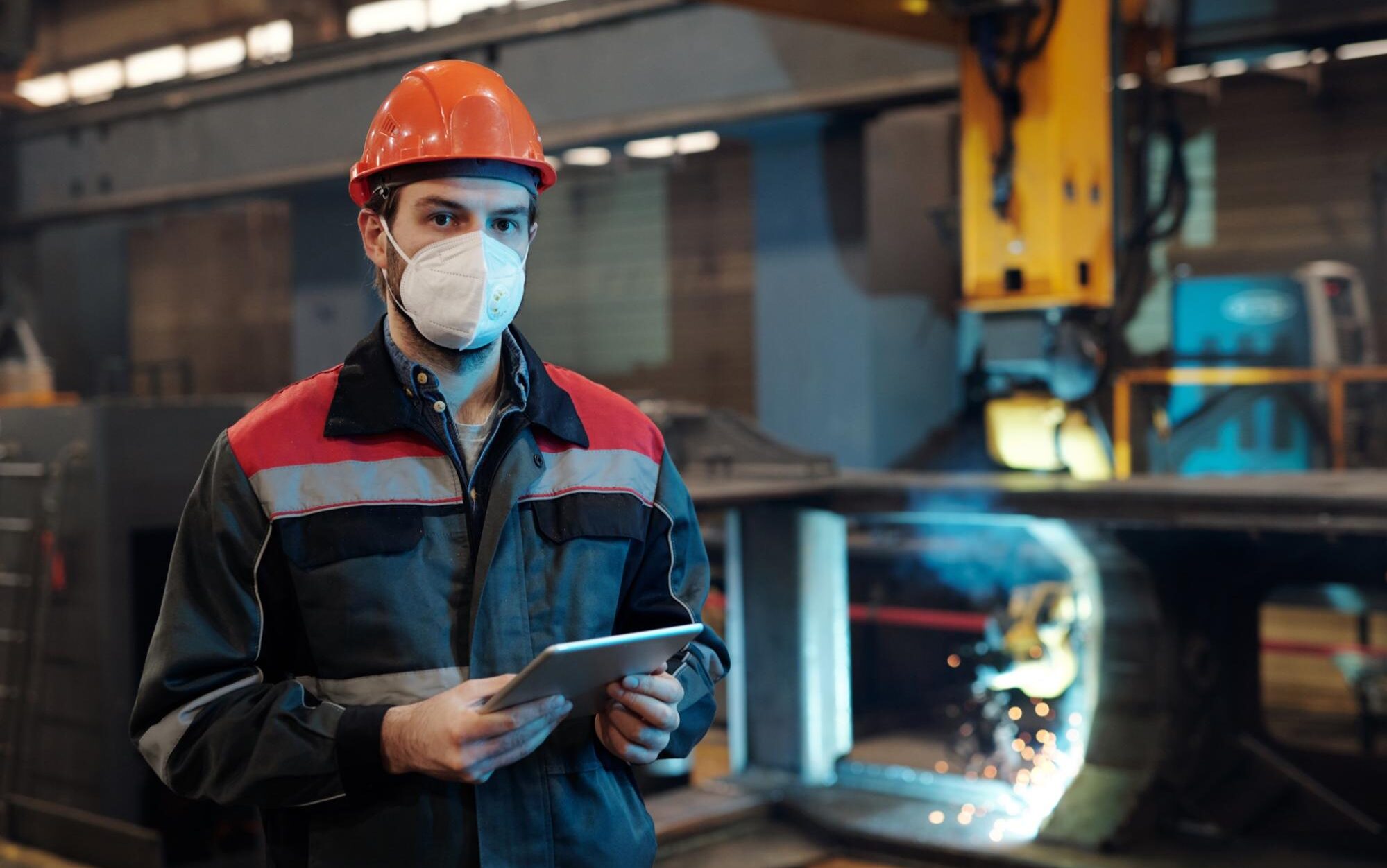 Engineer holding a digital tablet