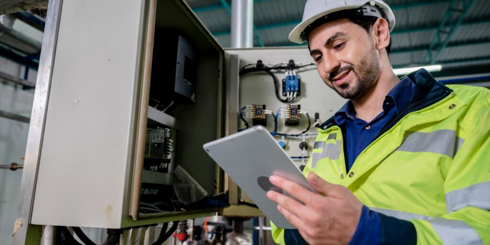 frontline worker looking at smart device featured image