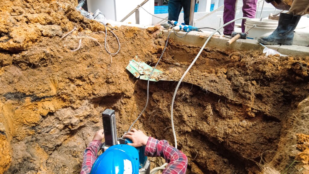 Engineers assessing excavation site