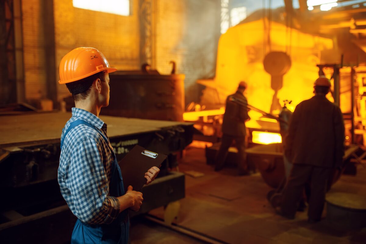workers in steel production foundry