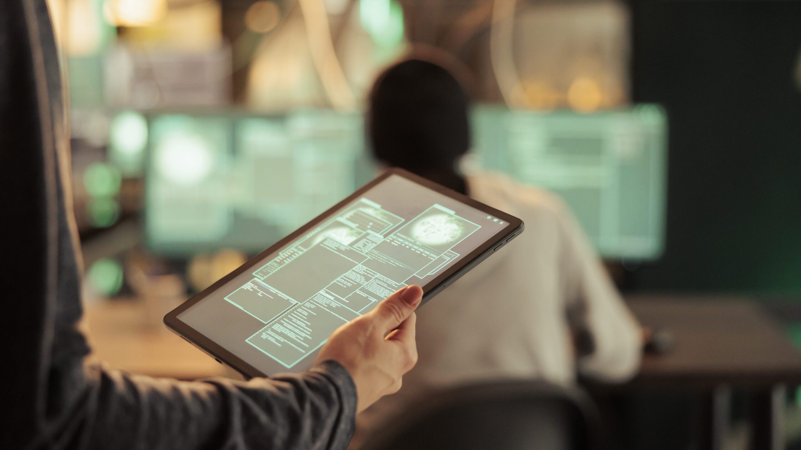 person holding tablet