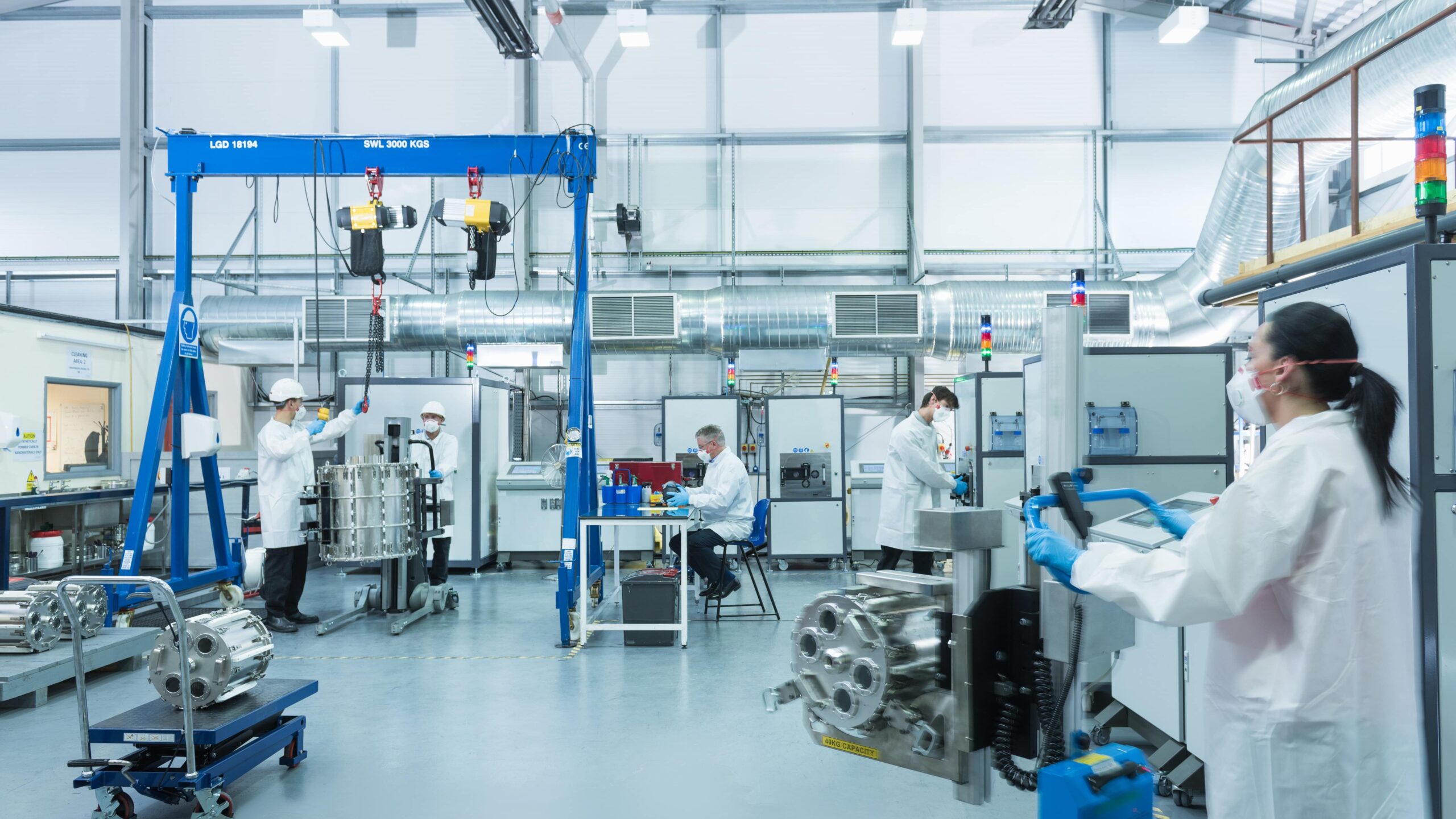 workers inside clean graphene factory