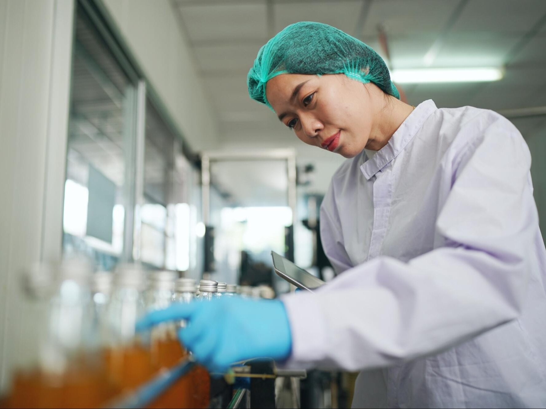 drink production employee at beverage factory